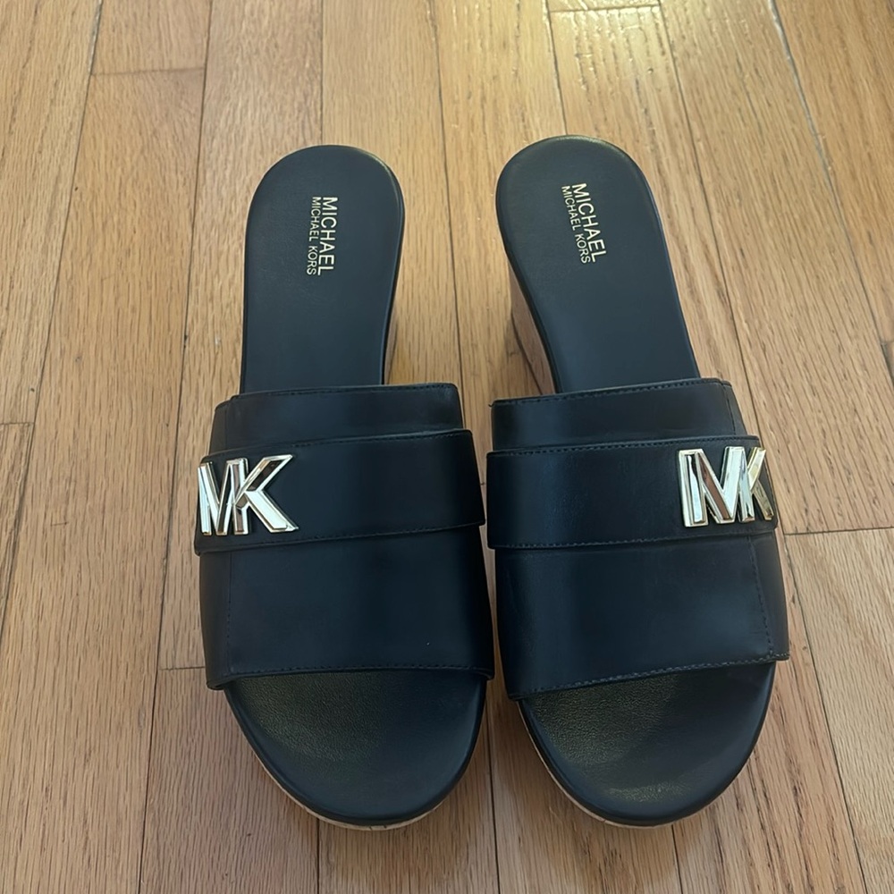 Michael Kors size 8 1/2. Never worn